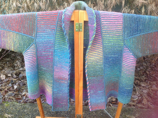 Joan's panel jacket, a sweater knit in panels of stripes of Noro striping yarn alternating with solid yarn