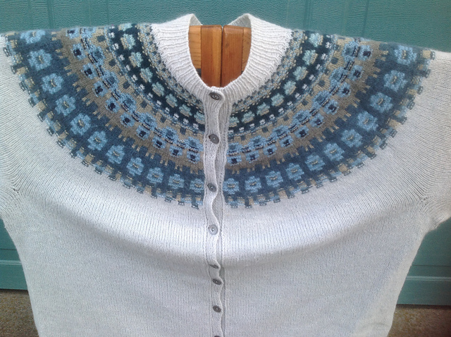 Joan's Blue Shimmer, a white Bohus sweater with a yoke pattern in shades of blue